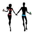 Couple silhouettes in swimwears with cocktails in hands.