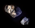 A couple of silicon mineral nuggets from Novy Volkovysk, Belarus. A photo of stones isolated on black. For Geology minerology