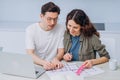 Couple talks about drawings of appartment renovation Royalty Free Stock Photo