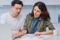 Couple talks about drawings of appartment renovation Royalty Free Stock Photo