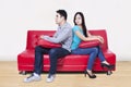 Couple sitting back to back after a fight Royalty Free Stock Photo