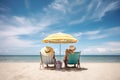 Couple sitting on the beach with sunshades and umbrellas, rear view of a Retired traveling couple resting together on sun loungers Royalty Free Stock Photo