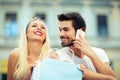 Couple sitting on the bench after the shooping Royalty Free Stock Photo