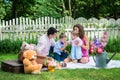 A couple sitting with the children Royalty Free Stock Photo