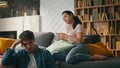 Couple sitting couch gadgets at weekend evening closeup. Carefree family leisure Royalty Free Stock Photo