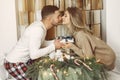 Couple spend time at home with christmas decorations Royalty Free Stock Photo