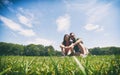 Couple sitting on the grass in Central Park, New York City. Royalty Free Stock Photo