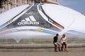 Couple sitting near EURO 2012 ball