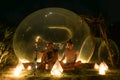 Badung - A couple sitting in front of a bubble hotel