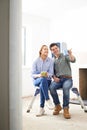 Couple Sitting In Property Being Renovated Royalty Free Stock Photo