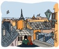 Couple sitting on the roof in Paris