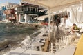 A couple sitting at a seafront restaurant, Mykonos Greece