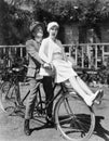 Couple sitting on a tandem bicycle Royalty Free Stock Photo
