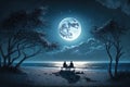 Couple sitting together enjoyin the romantic view of the moonlight at a beautiful beach Royalty Free Stock Photo