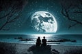 Couple sitting together enjoying the romantic view of the moonlight at a beautiful beach Royalty Free Stock Photo