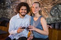 Couple sitting together and having glass of wine Royalty Free Stock Photo