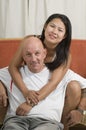 Couple sitting together and smiling