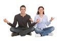 Couple sitting in yoga position