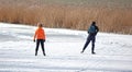 Couple skating on natural ice, Netherlands
