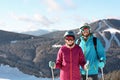 Couple with ski equipment spending winter vacation Royalty Free Stock Photo