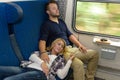 Couple sleeping in train woman man vacation Royalty Free Stock Photo
