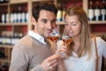 couple smelling bouquet glass wine in wine tasting
