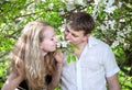 Couple smelling flowers Royalty Free Stock Photo