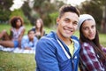 Couple, smile and portrait with love in park with bonding and fun on campus outdoor. Students, grass and happy together Royalty Free Stock Photo
