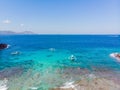 Couple snorkeling in the blue sea ocean and coral background aerial top view Royalty Free Stock Photo