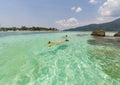 couple snorkeling in clear blue sea Royalty Free Stock Photo