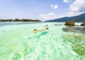 couple snorkeling in clear blue sea Royalty Free Stock Photo