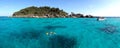 Couple snorkeling in crystal water at similan island, Andaman sea, Phuket