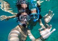 Couple snorkeling in Maldives