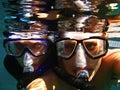 A Couple snorkelling in a sea. Royalty Free Stock Photo