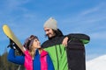 Couple With Snowboard Ski Resort Snow Winter Mountain Smiling Man And Woman Extreme Sport Vacation Royalty Free Stock Photo