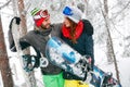 Couple snowboarder having fun in the fog winter forest Royalty Free Stock Photo