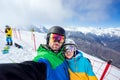 Couple snowboarders doing selfie on camera Royalty Free Stock Photo