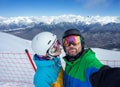 Couple snowboarders doing selfie on camera Royalty Free Stock Photo