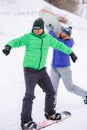 Couple snowboarders playing and having fun in nature Royalty Free Stock Photo