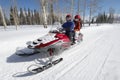 Couple On Snowmobile Royalty Free Stock Photo