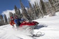 Couple On Snowmobile Royalty Free Stock Photo