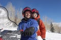 Couple On Snowmobile Royalty Free Stock Photo