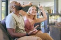 Couple On Sofa At Home Together Playing Computer Game With Woman Winning Royalty Free Stock Photo