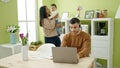 Couple and son taking care of son working at home Royalty Free Stock Photo