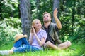 Couple soulmates at romantic date. Romantic couple students enjoy leisure looking upwards observing nature background