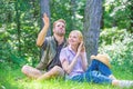 Couple soulmates at romantic date. Romantic couple students enjoy leisure looking upwards observing nature background