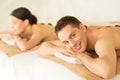 Couple in spa with hot stones Royalty Free Stock Photo