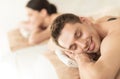 Couple in spa with hot stones Royalty Free Stock Photo