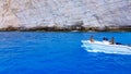 Couple on a speedboat.