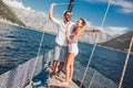 Couple spending happy time on a yacht at sea. Luxury vacation on a seaboat Royalty Free Stock Photo